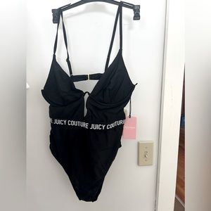 Juicy couture underwire one piece black and white new with tags!! Size LG